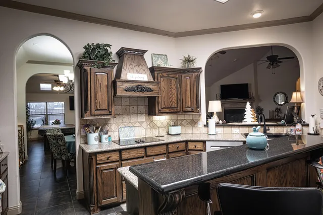 a living room with furniture potted plant and a window