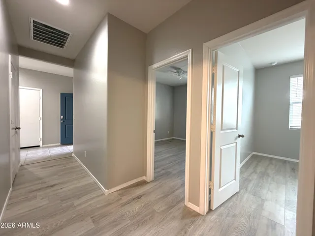 wooden floor with a bedroom