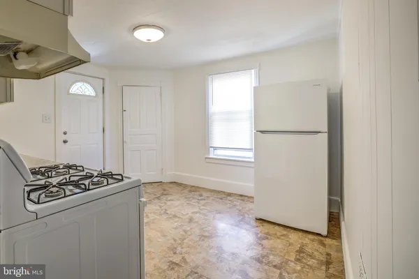 a view of kitchen and utility room