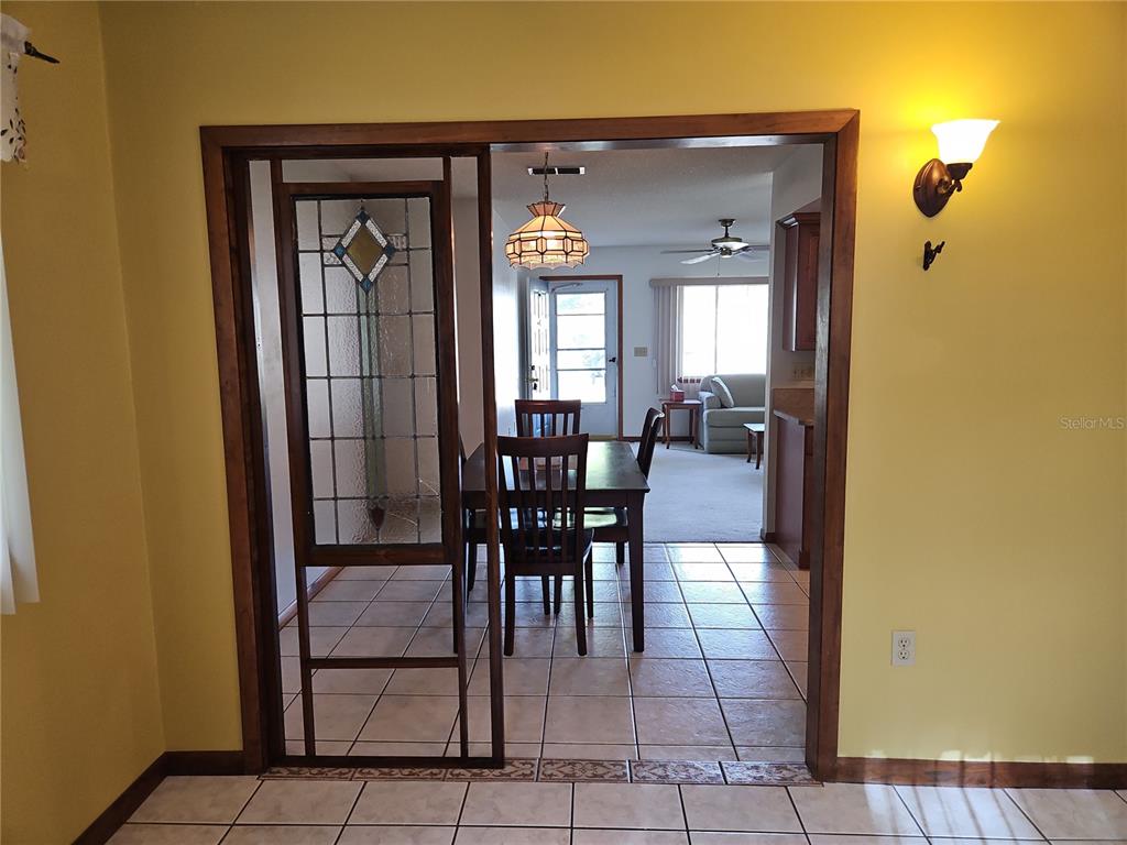 11087 Southwest 77th Court Ocala, FL 34476 - Photo 12 of 31 a view of a livingroom with furniture and window