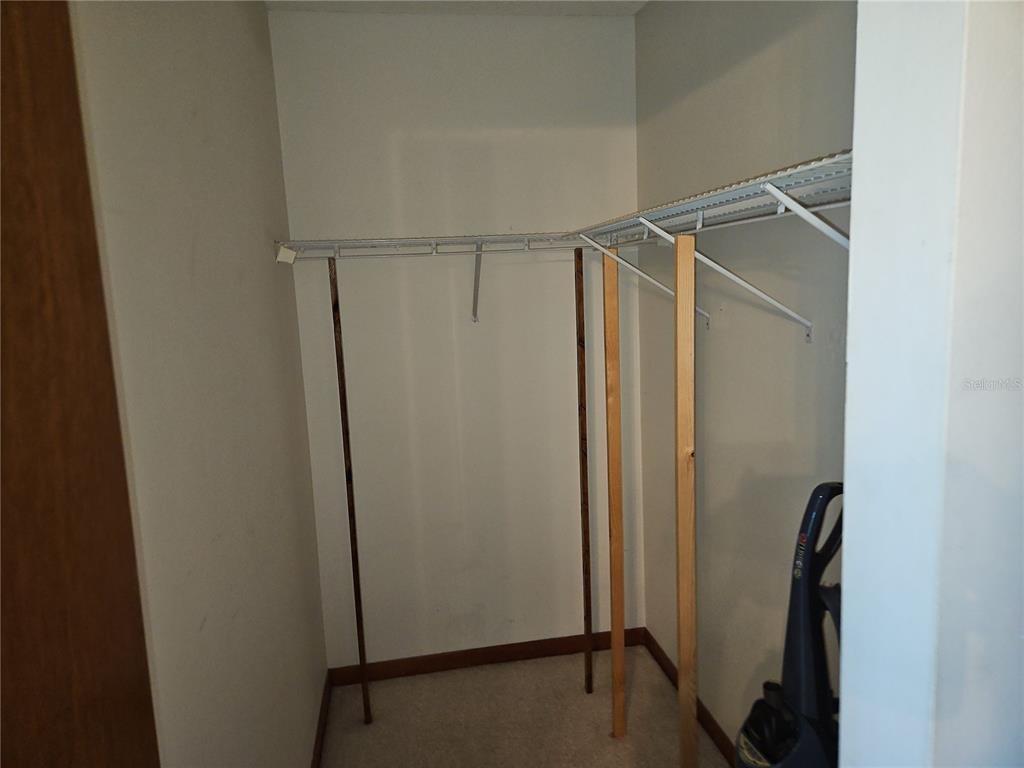 11087 Southwest 77th Court Ocala, FL 34476 - Photo 18 of 31 a view of walk in closet