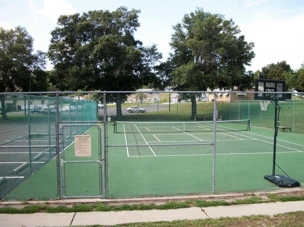 11087 Southwest 77th Court Ocala, FL 34476 - Photo 31 of 31 a view of a tennis court