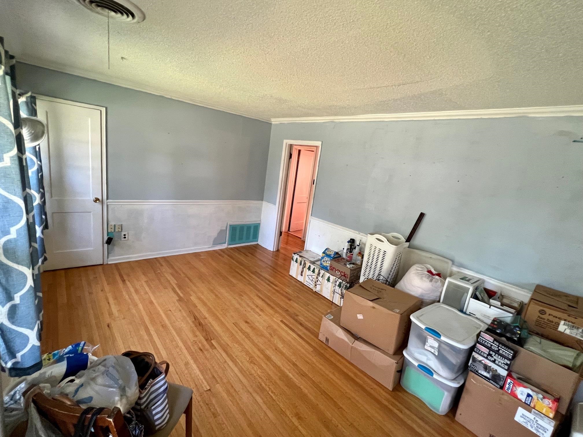 4356 Grey Road Memphis, TN 38108 - Photo 4 of 22 a bed room with a bed and a couch