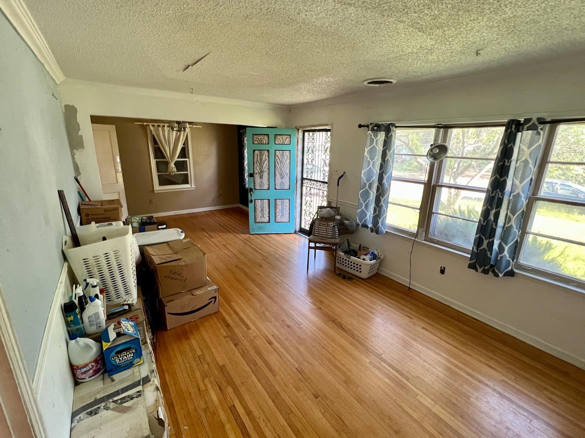 4356 Grey Road Memphis, TN 38108 - Photo 5 of 22 a bed room with furniture and a large window