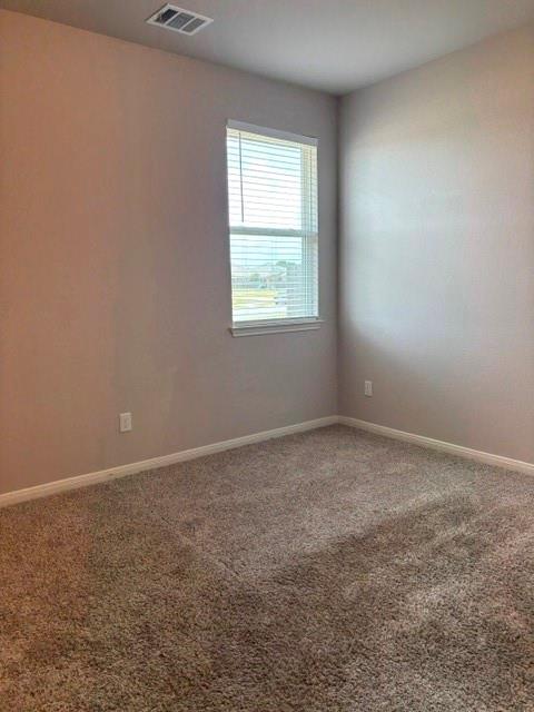 4053 Centerfire Road Waco, TX 76705 - Photo 22 of 29 Bedroom #3 with carpet and blinds