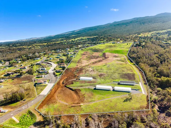 a view of an ocean beach and city view