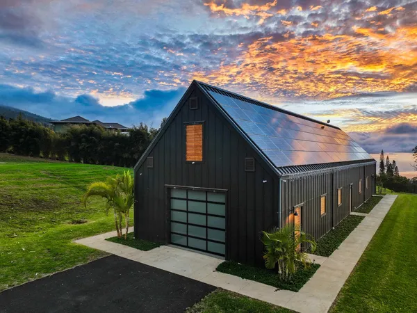 a backyard of a house with lots of green space