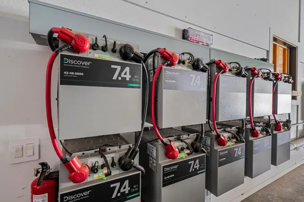 a view of a storage room with shoes and a couch