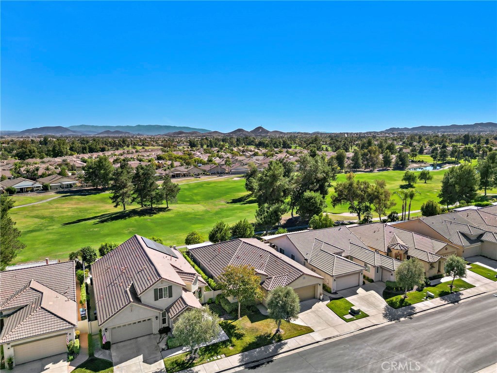 28545 Raintree Drive Menifee, CA 92584 - Photo 2 of 33 an aerial view of a house with a garden