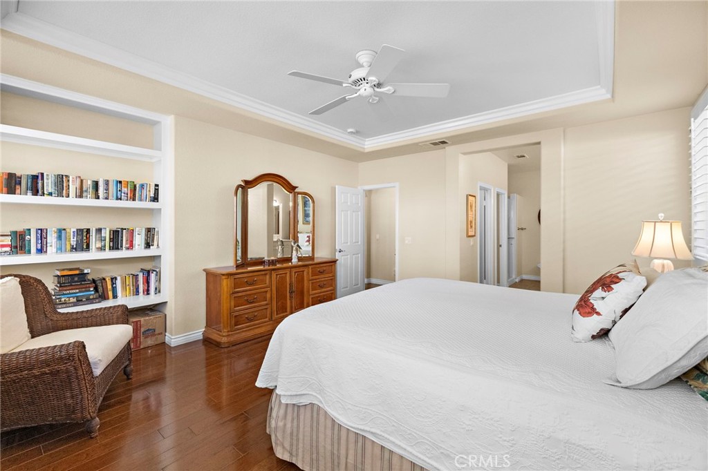 28545 Raintree Drive Menifee, CA 92584 - Photo 23 of 33 a bedroom with a bed furniture and a window