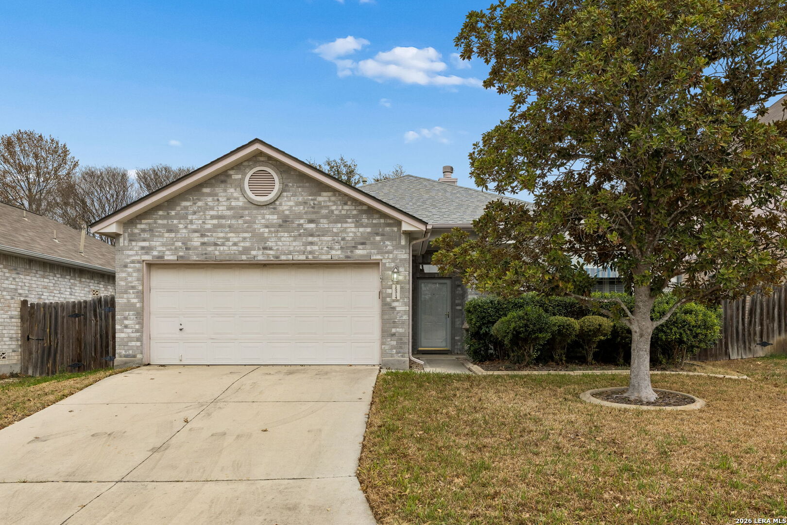 15314 Spring Land San Antonio, TX 78247 - Photo 1 of 49 a front view of a house with a yard