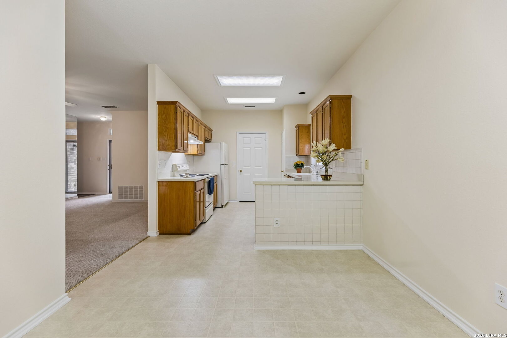15314 Spring Land San Antonio, TX 78247 - Photo 23 of 49 a view of a room with kitchen and window