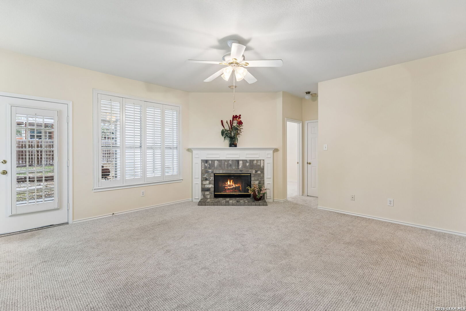 15314 Spring Land San Antonio, TX 78247 - Photo 33 of 49 an empty room with windows and fireplace
