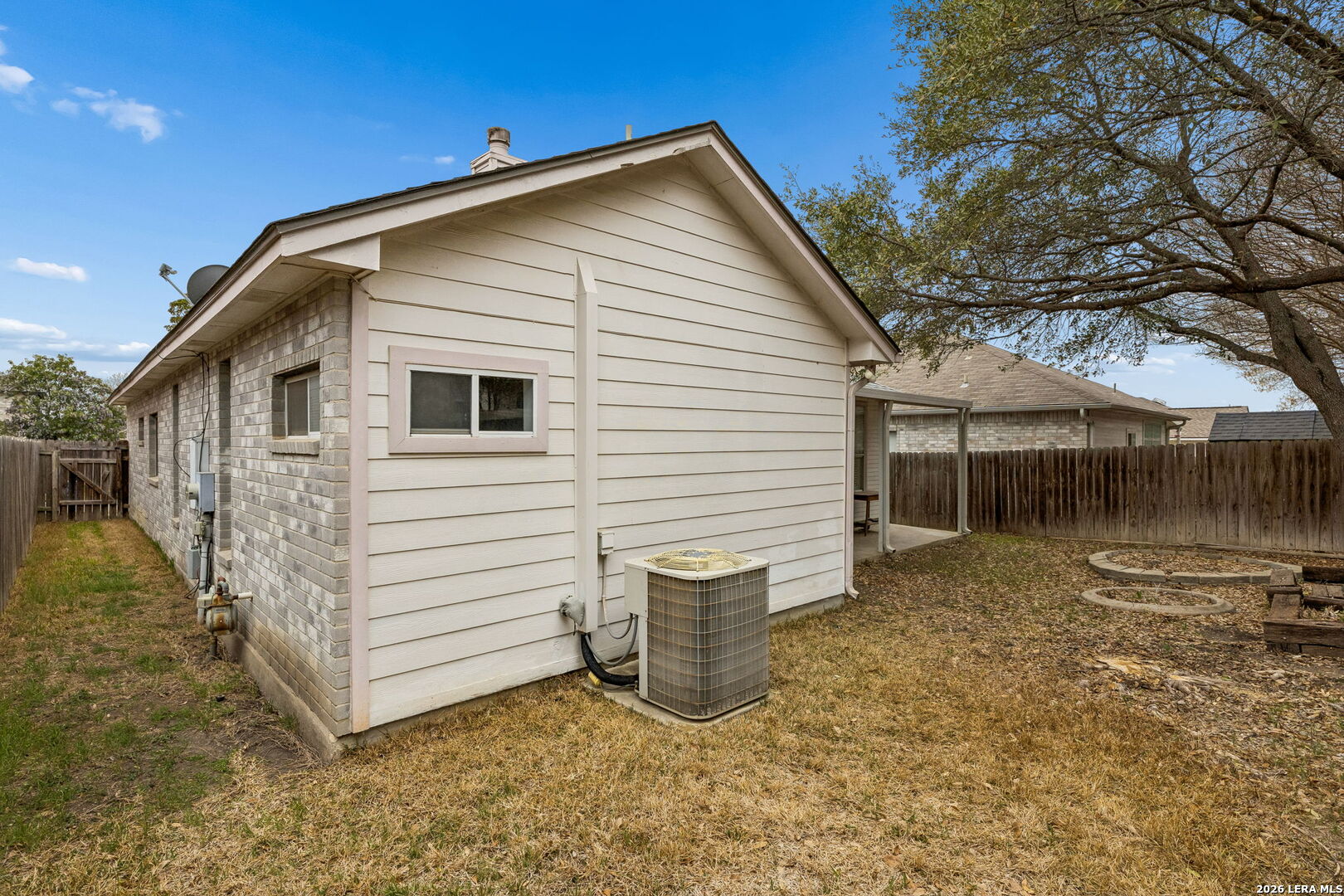 15314 Spring Land San Antonio, TX 78247 - Photo 39 of 49 a view of a house with a yard