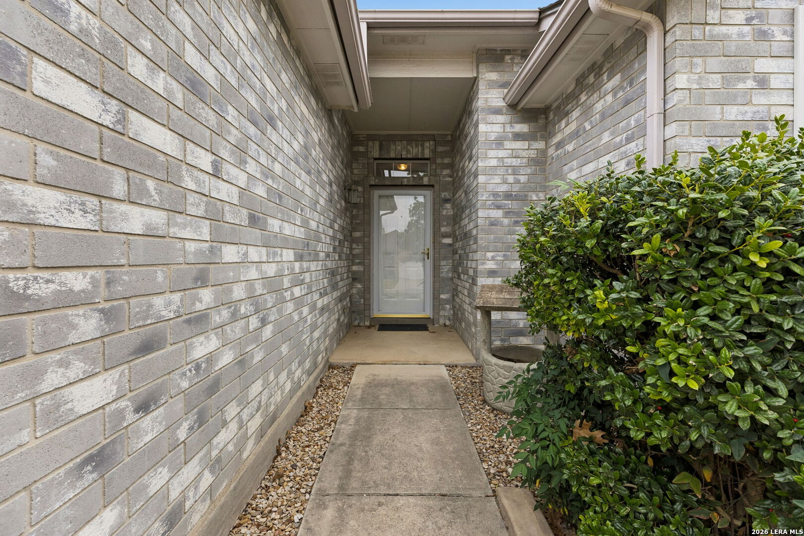 15314 Spring Land San Antonio, TX 78247 - Photo 4 of 49 a view of a pathway both side of building