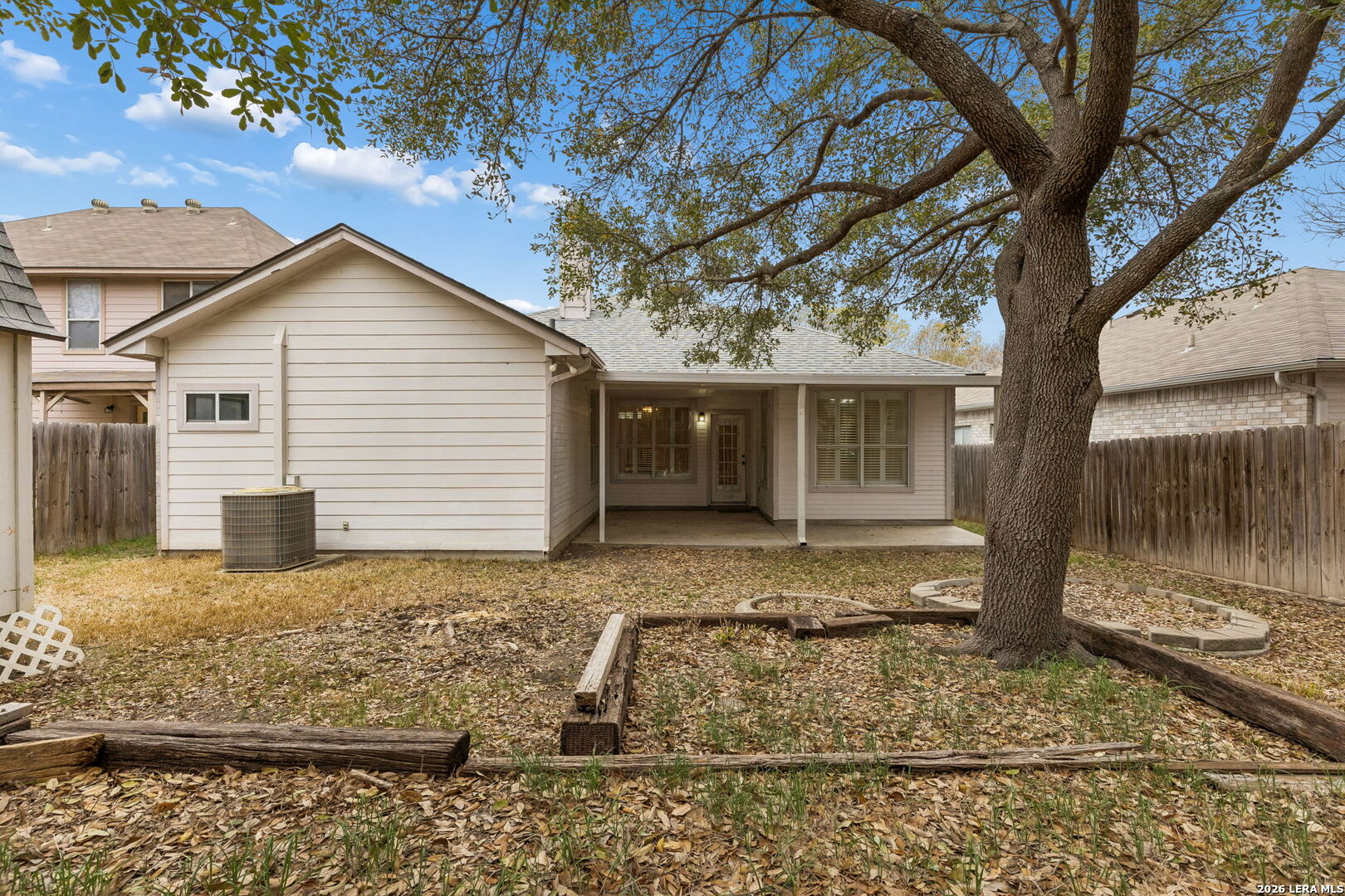 15314 Spring Land San Antonio, TX 78247 - Photo 41 of 49 a view of a house with a yard