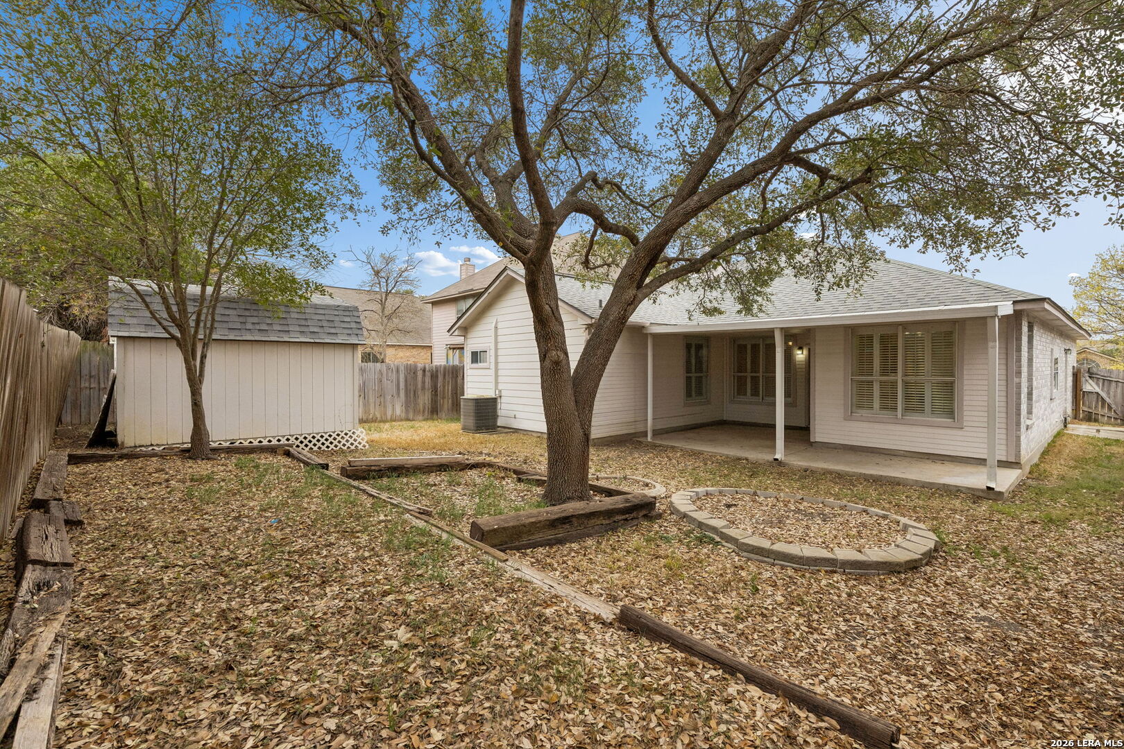 15314 Spring Land San Antonio, TX 78247 - Photo 42 of 49 a house with trees in front of it