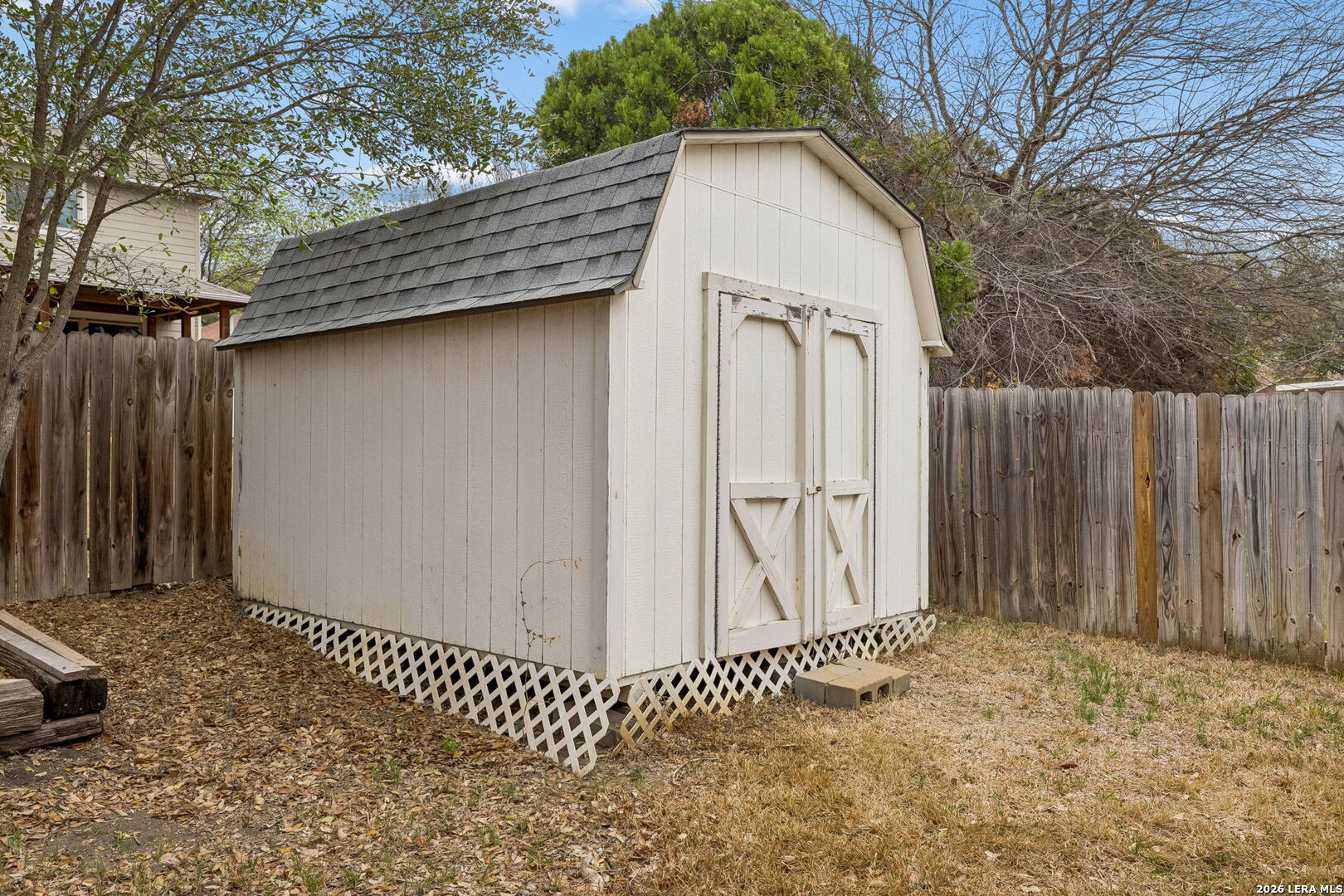 15314 Spring Land San Antonio, TX 78247 - Photo 44 of 49 a view of a house with a wooden fence