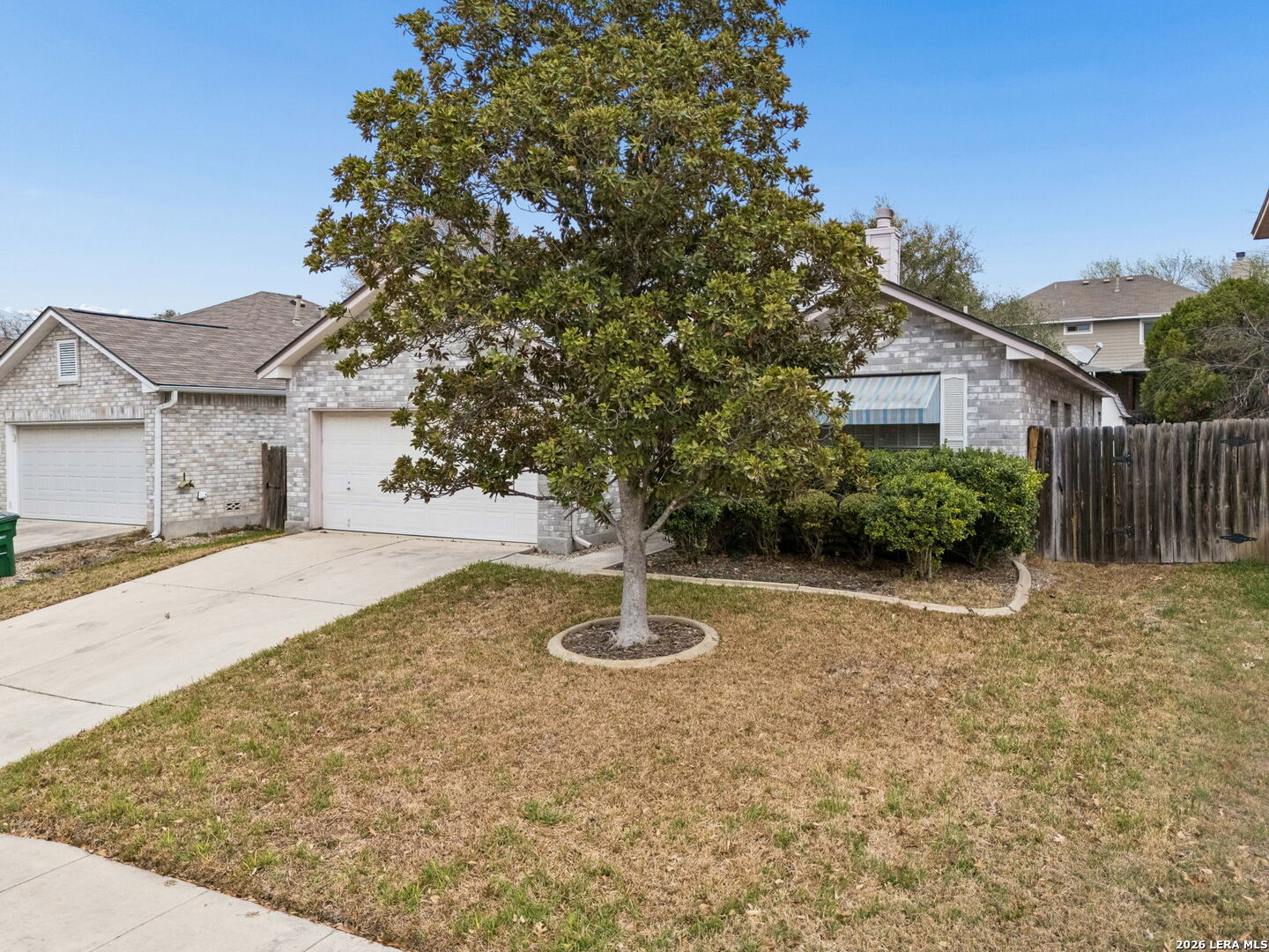15314 Spring Land San Antonio, TX 78247 - Photo 48 of 49 a backyard of a house with table and chairs