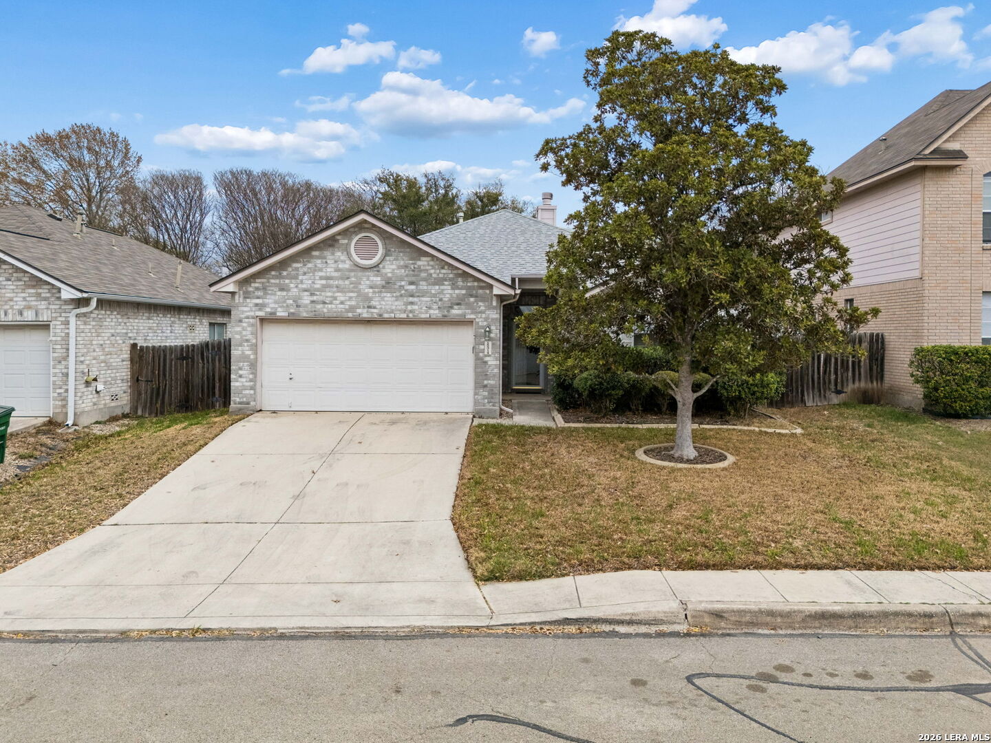 15314 Spring Land San Antonio, TX 78247 - Photo 49 of 49 a front view of a house with a yard