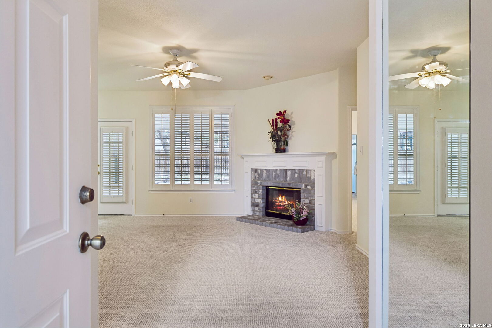 15314 Spring Land San Antonio, TX 78247 - Photo 8 of 49 a living room with furniture and a fireplace
