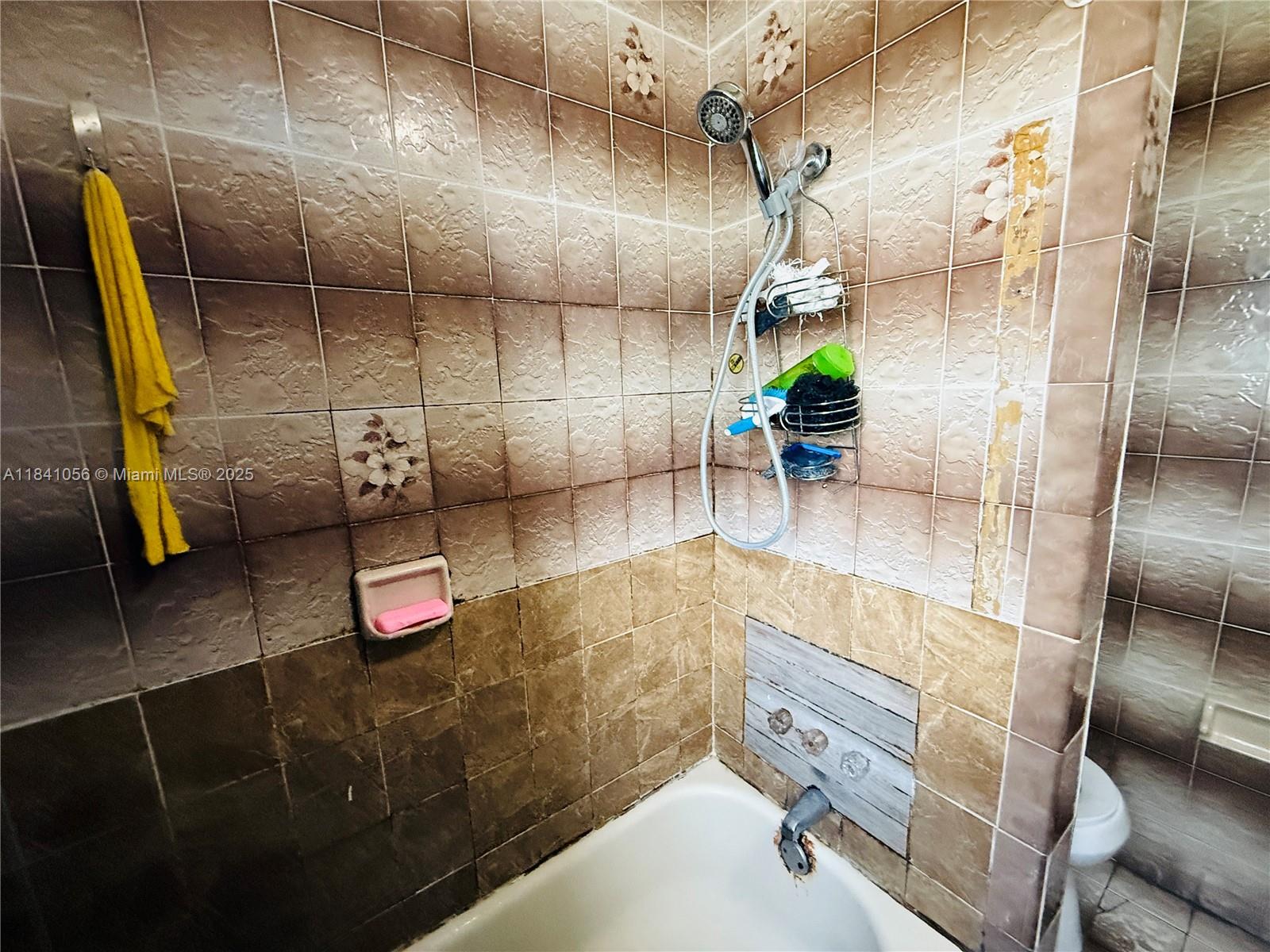 1873 Southwest 3rd Street Miami, FL 33135 - Photo 17 of 18 a bathroom with a sink and a mirror