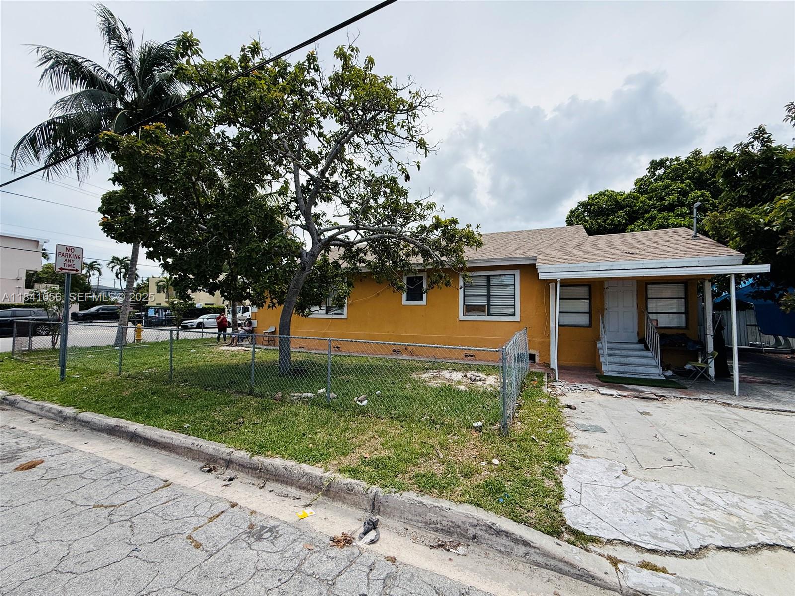 1873 Southwest 3rd Street Miami, FL 33135 - Photo 4 of 18 front view of a house with a yard