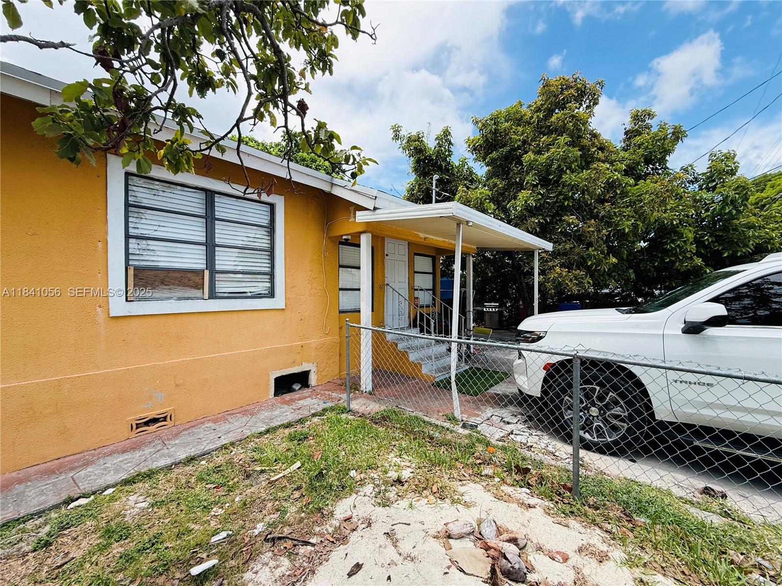 1873 Southwest 3rd Street Miami, FL 33135 - Photo 5 of 18 a view of a house with a patio