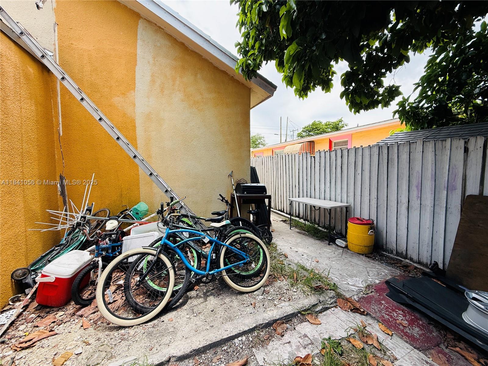1873 Southwest 3rd Street Miami, FL 33135 - Photo 8 of 18 a view of a backyard with door and deck