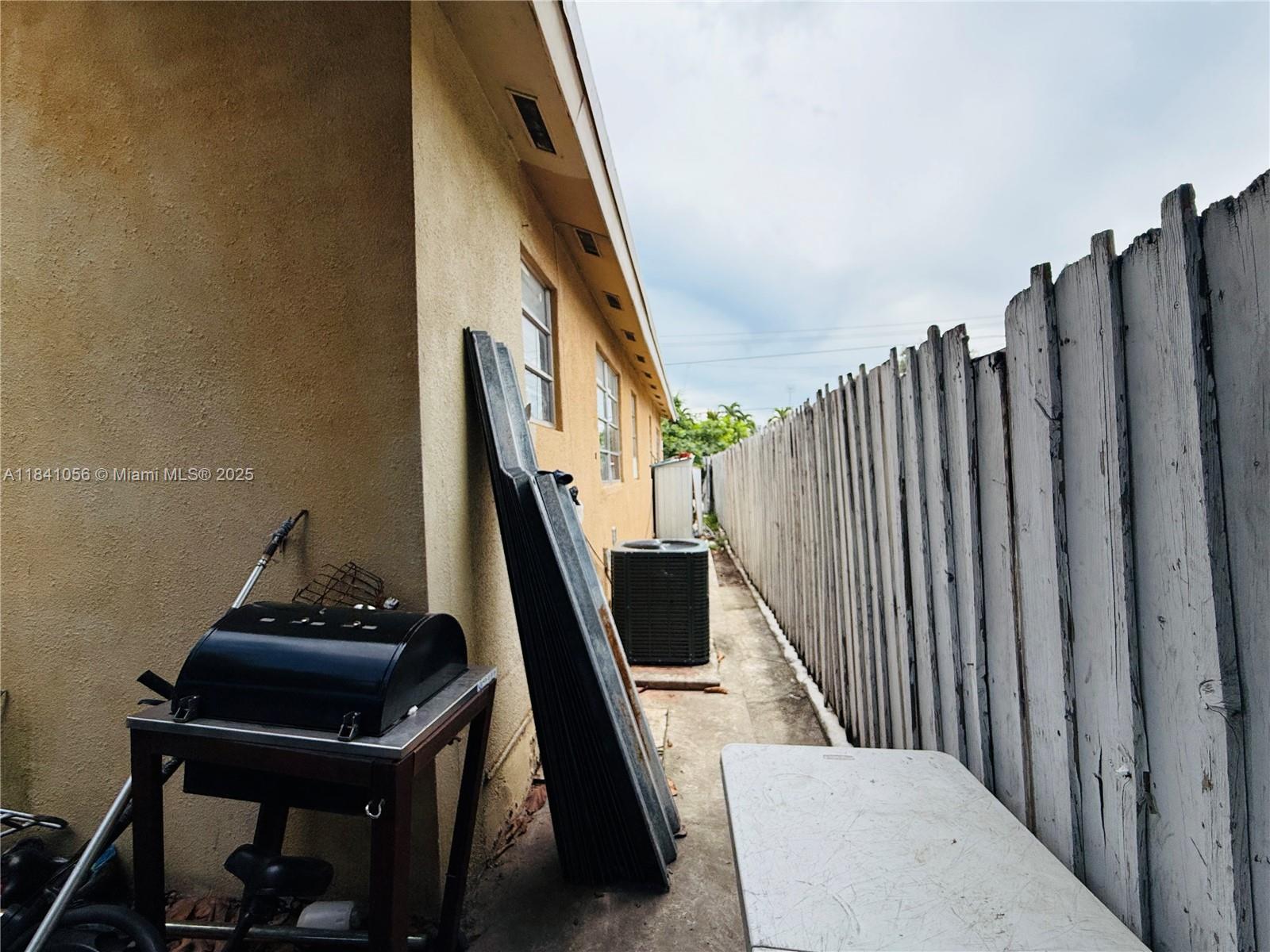 1873 Southwest 3rd Street Miami, FL 33135 - Photo 9 of 18 a view of entryway and hall with wooden floor