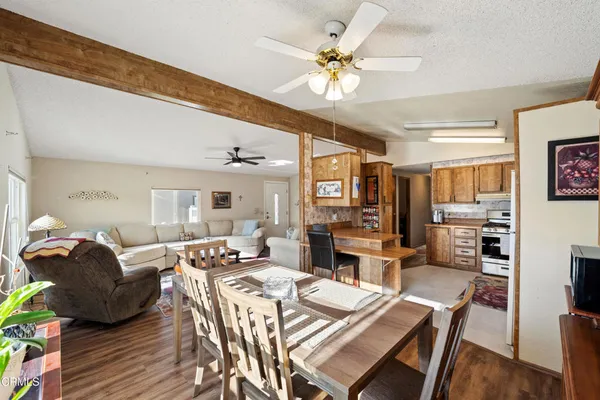 a view of a dining room with furniture