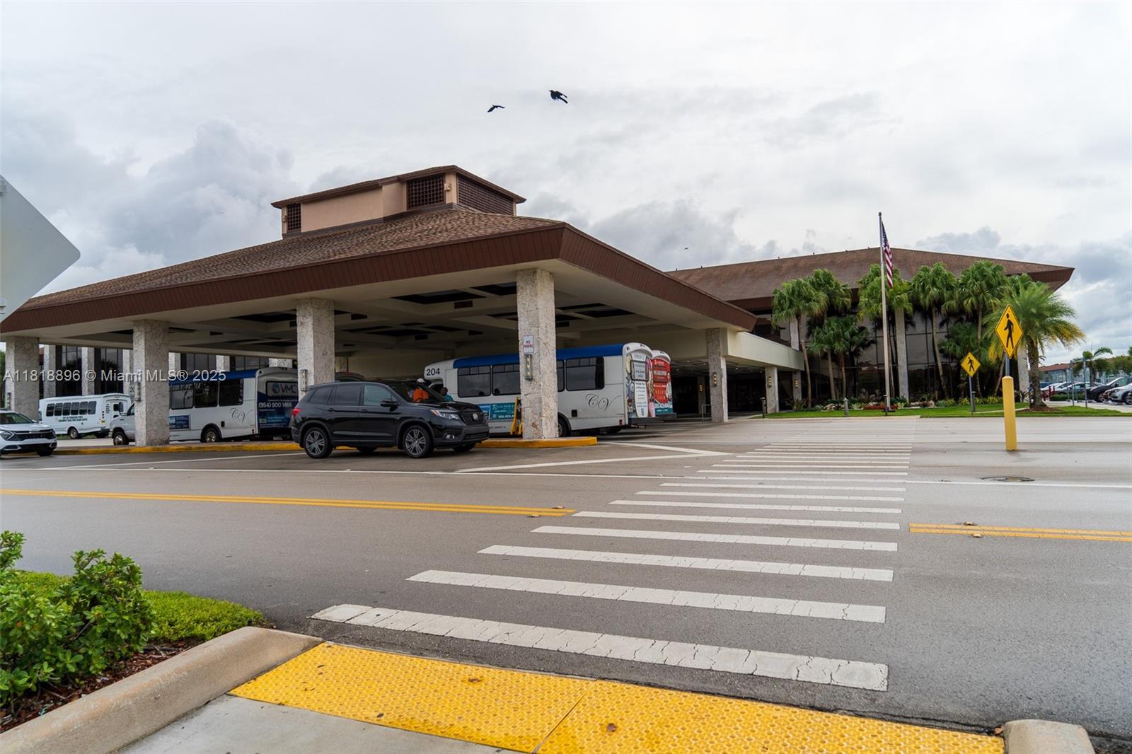 800 Southwest 142nd Avenue, Unit 211N Pembroke Pines, FL 33027 - Photo 27 of 28 a view of a house with a swimming pool