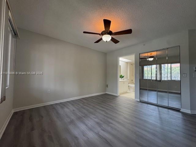 800 Southwest 142nd Avenue, Unit 211N Pembroke Pines, FL 33027 - Photo 6 of 28 wooden floor in an empty room with a window