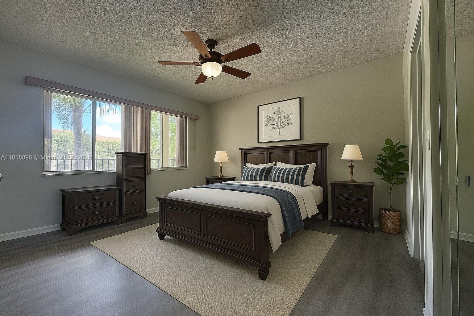 800 Southwest 142nd Avenue, Unit 211N Pembroke Pines, FL 33027 - Photo 7 of 28 a spacious bedroom with a bed and a chandelier