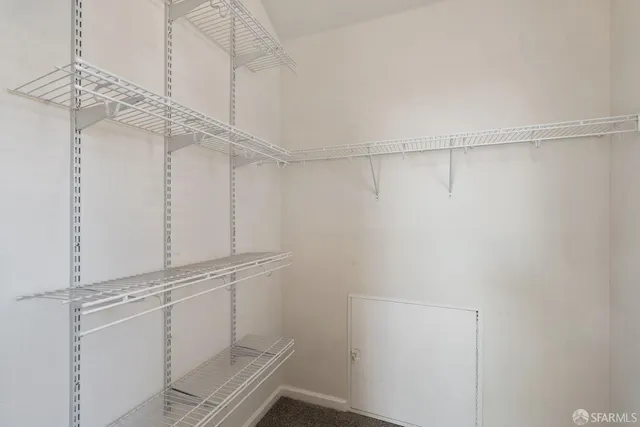 a view of a room with racks on the wall