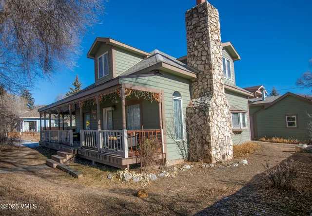 an aerial view of a residential apartment building with a mountain