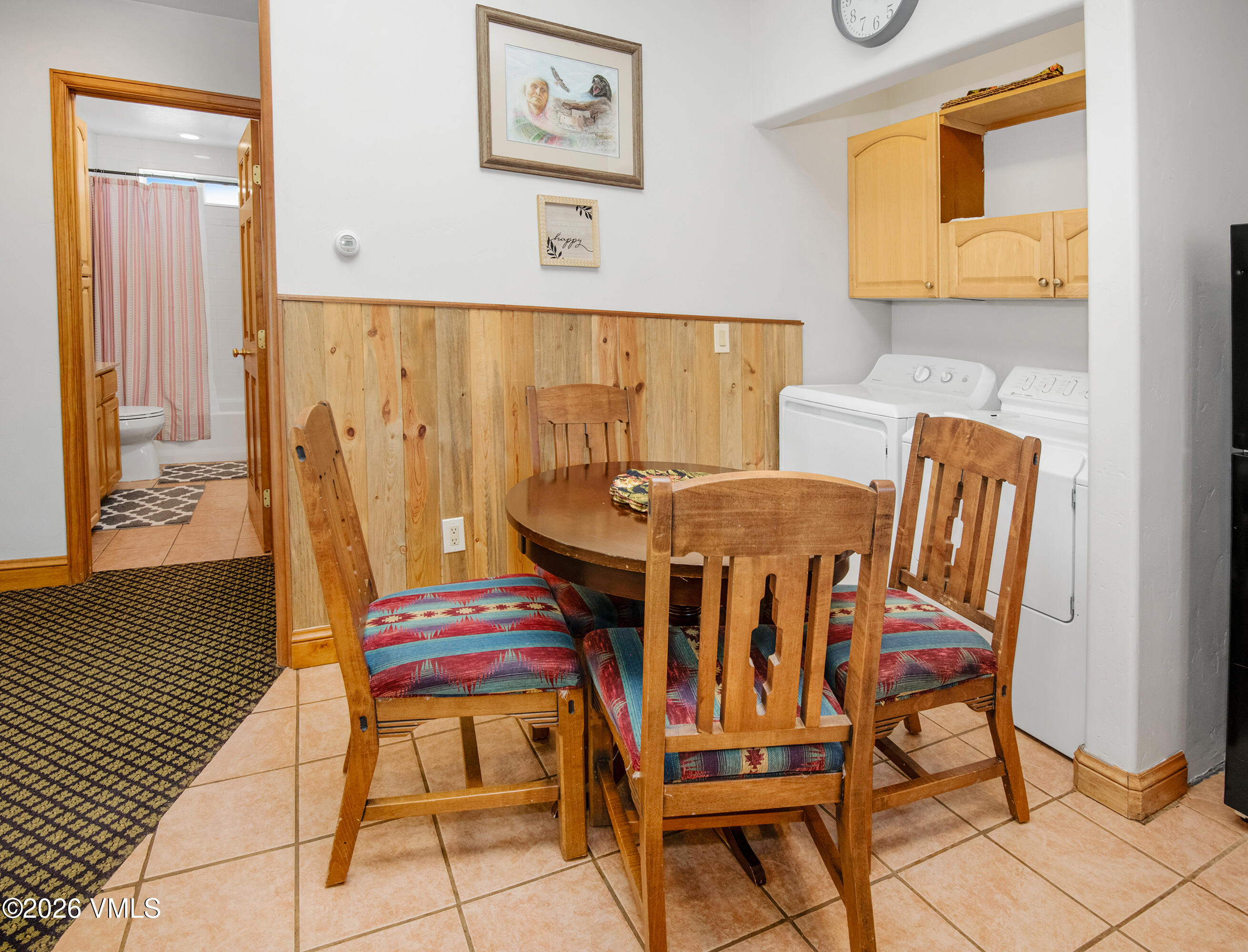 344 Capitol Street Eagle, CO 81631 - Photo 57 of 63 a view of a dining room with furniture and wooden floor