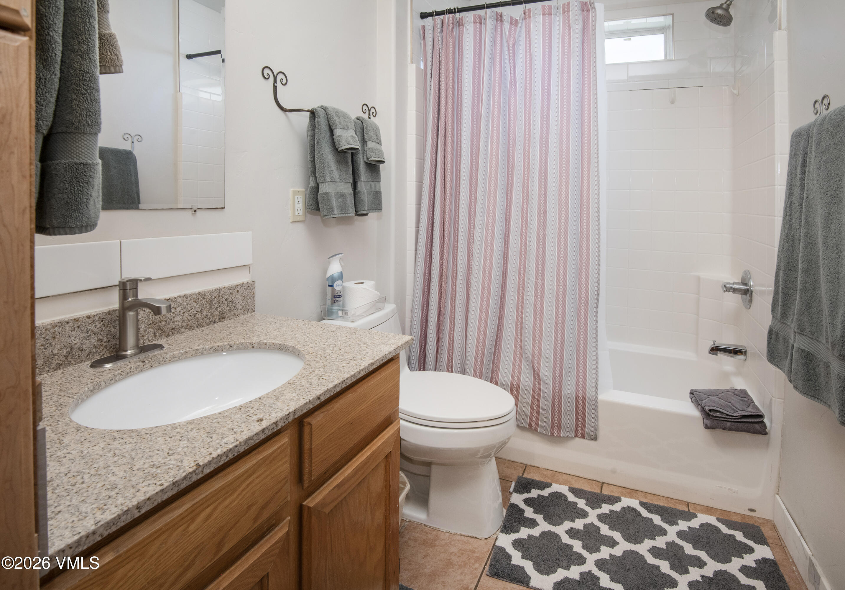 344 Capitol Street Eagle, CO 81631 - Photo 60 of 63 a bathroom with a granite countertop sink toilet and shower
