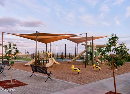 a view of a park with iron stairs