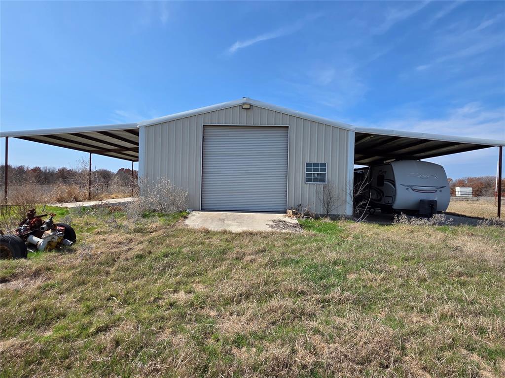 1000 County Road 375 Rising Star, TX 76471 - Photo 3 of 40 a view of a house with a yard