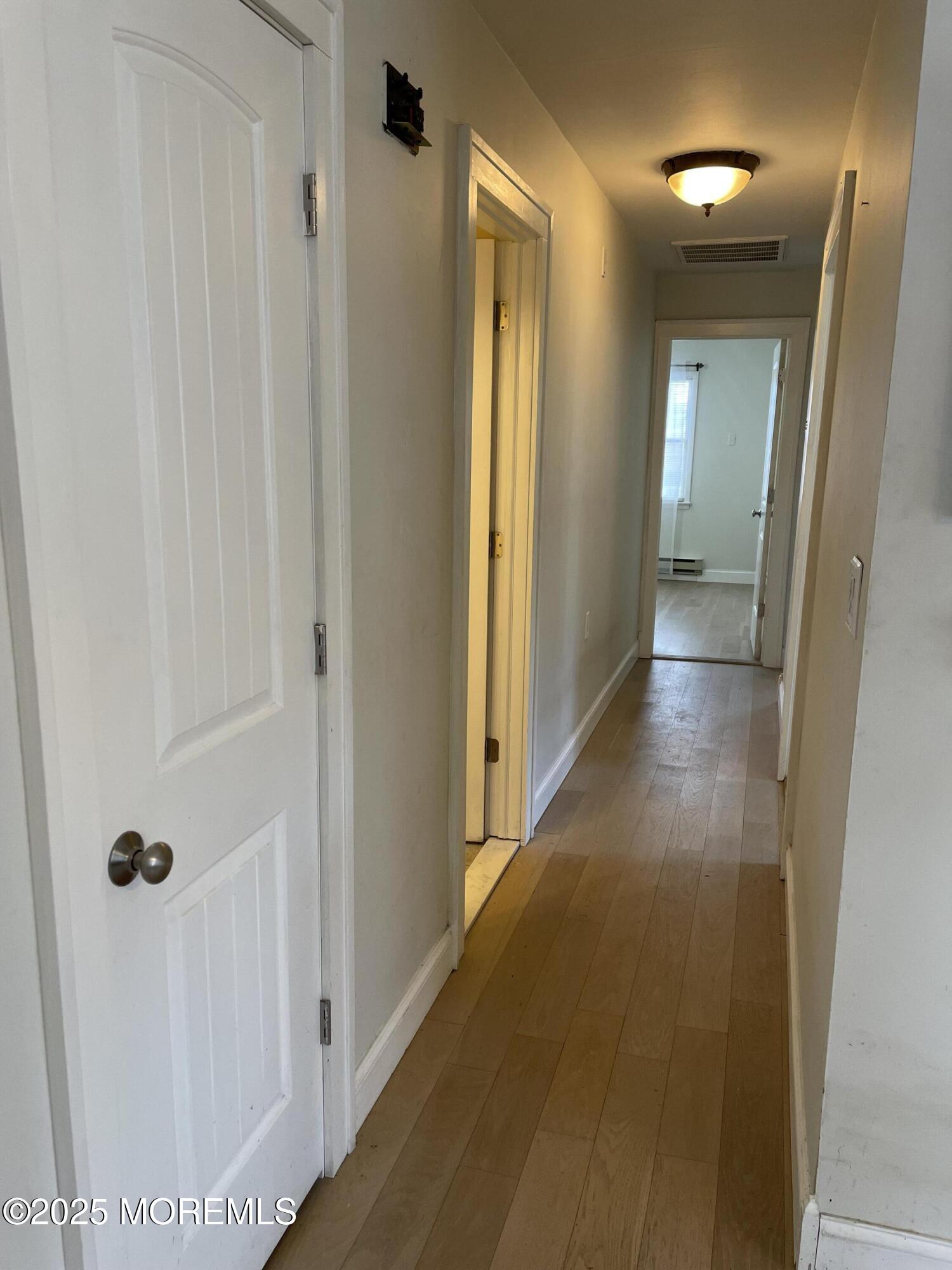 35 Sycamore Access Road, Unit 12 Manahawkin, NJ 08050 - Photo 11 of 34 a view of a hallway with elevator