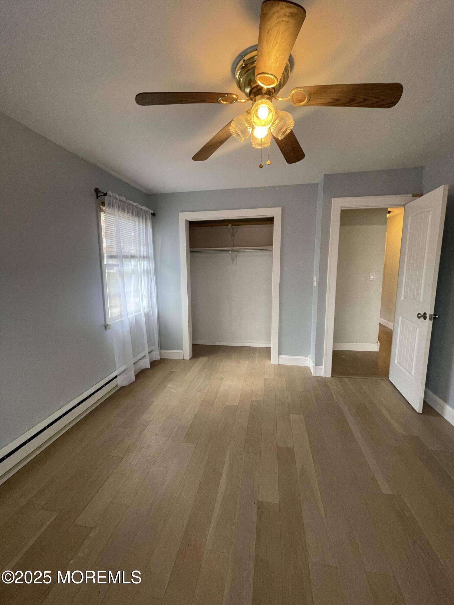 35 Sycamore Access Road, Unit 12 Manahawkin, NJ 08050 - Photo 21 of 34 a view of a livingroom with a chandelier