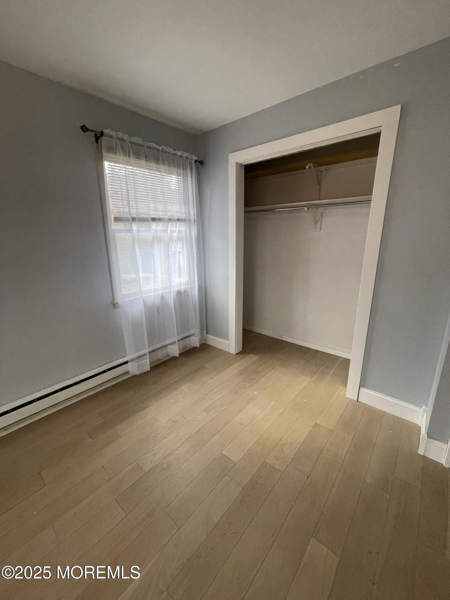 35 Sycamore Access Road, Unit 12 Manahawkin, NJ 08050 - Photo 22 of 34 an empty room with windows