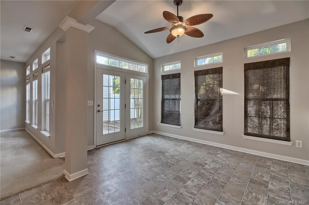 190 Snead Road, Unit 177 Fort Mill, SC 29715 - Photo 16 of 42 a view of an empty room with window and chandelier fan