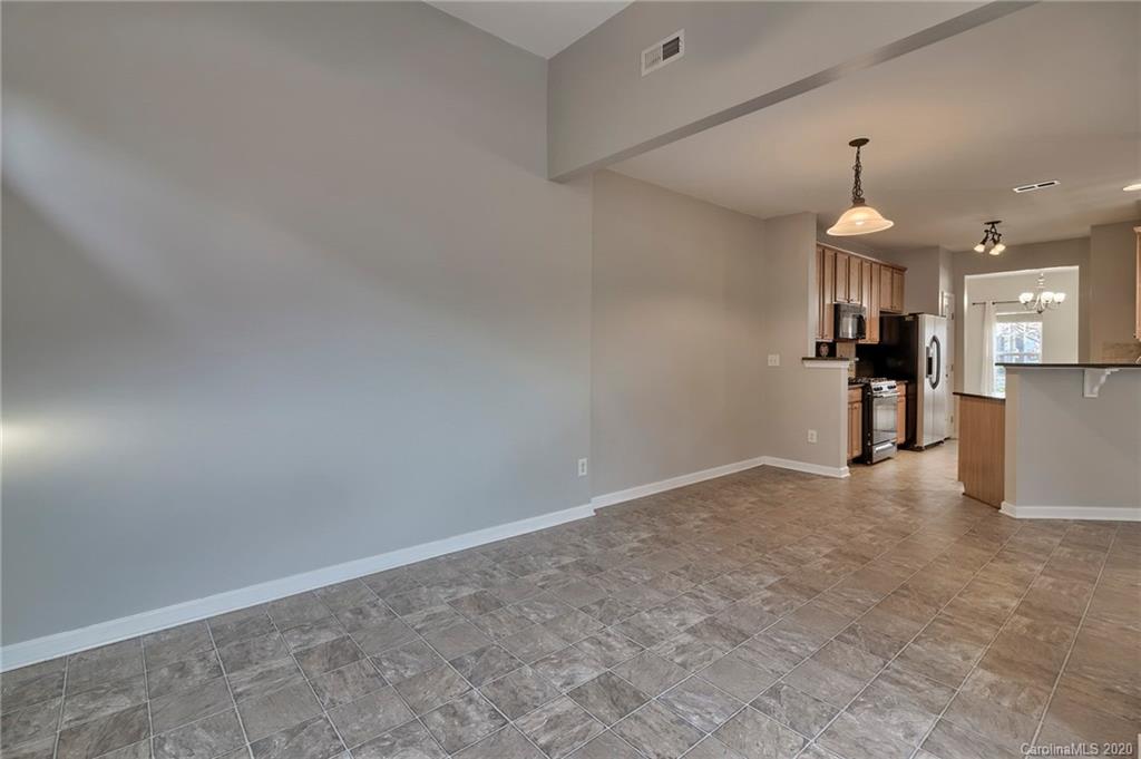 190 Snead Road, Unit 177 Fort Mill, SC 29715 - Photo 18 of 42 a view of a livingroom with a chandelier