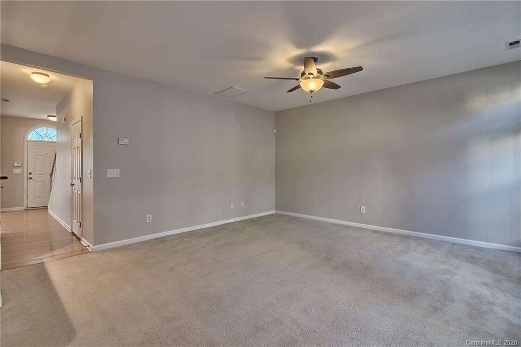190 Snead Road, Unit 177 Fort Mill, SC 29715 - Photo 20 of 42 an empty room with closet and a chandelier fan
