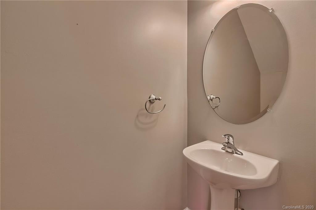 190 Snead Road, Unit 177 Fort Mill, SC 29715 - Photo 30 of 42 a bathroom with a sink and a mirror