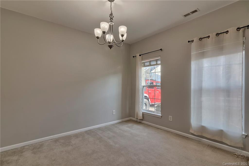 190 Snead Road, Unit 177 Fort Mill, SC 29715 - Photo 9 of 42 a view of a chandelier and window in a room