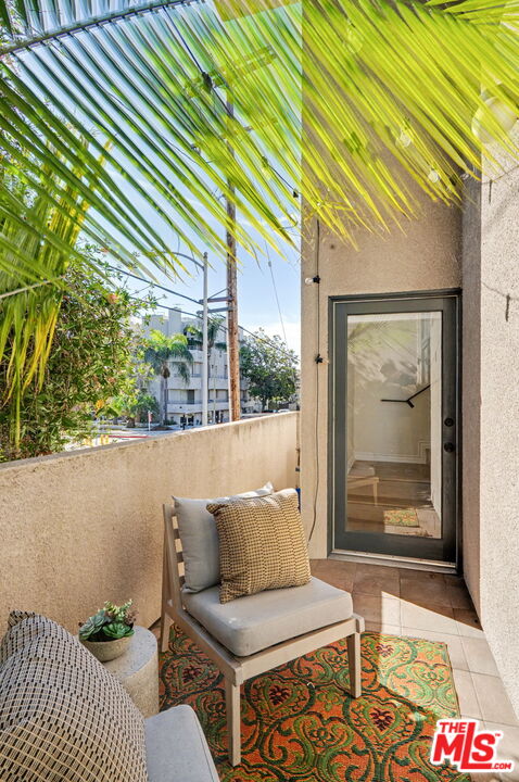 9917 Tabor Street, Unit 2 Los Angeles, CA 90034 - Photo 17 of 38 a outdoor living space with patio furniture