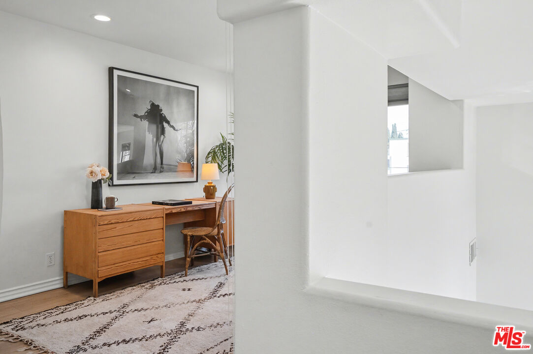 9917 Tabor Street, Unit 2 Los Angeles, CA 90034 - Photo 19 of 38 a view of room with workspace and a window